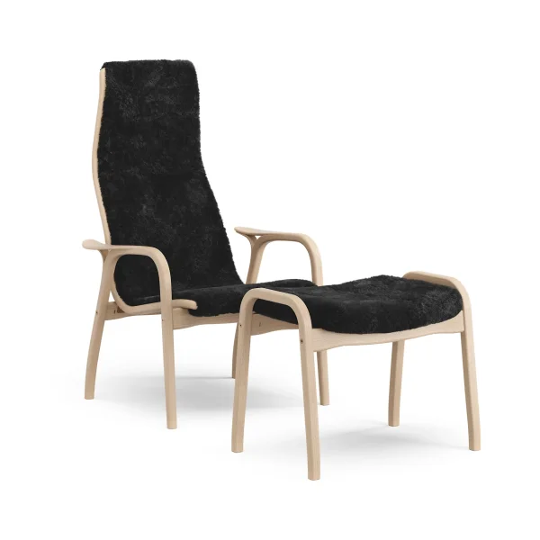 Swedese Lamino armchair and footstool Sheepskin Black-laquered beech