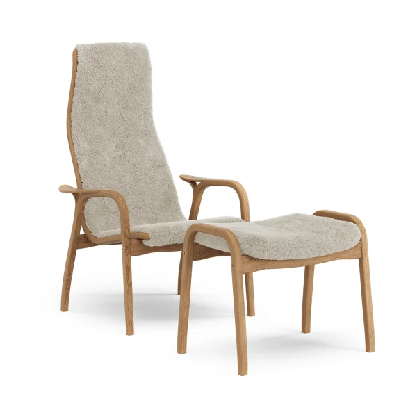 Swedese Lamino armchair and footstool Sheepskin Moonlight-oiled oak